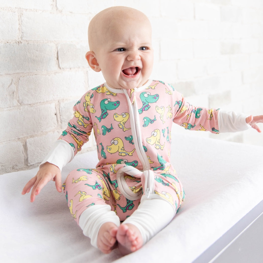 • Toddler Toothed Pink Dino • Bamboo Baby Onesie - Tegan & Ollie 