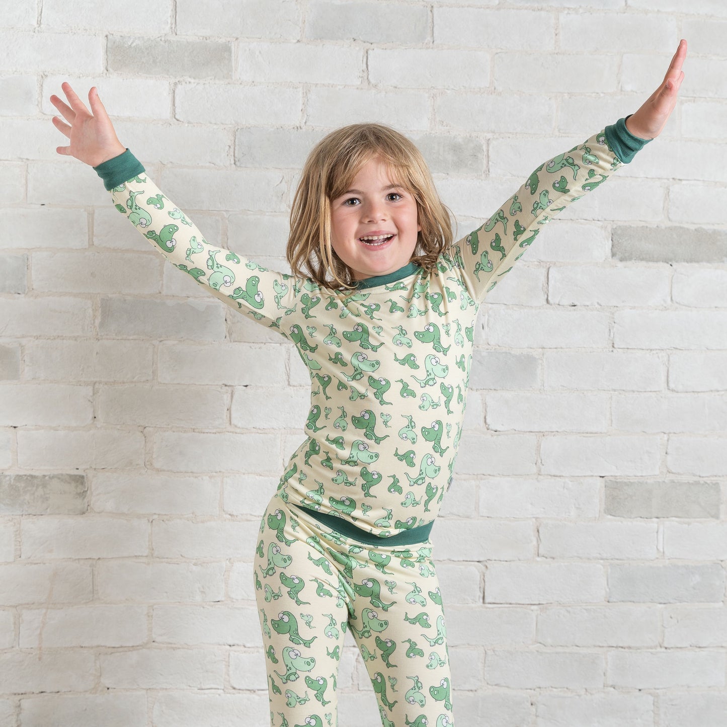 • Toddler Toothed Green Dino • ‘Sleep Tight’ Two-Piece Bamboo Pajama and Playtime Set
